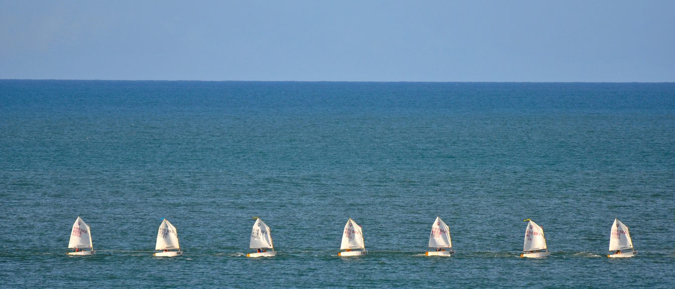 An open, calm ocean horizon under a clear sky